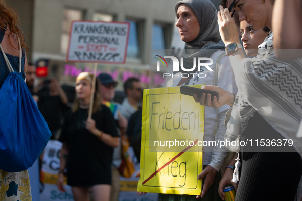 A few hundred people take part in an anti-war demonstration against government policy toward the war and demand peace in Cologne, Germany, o...