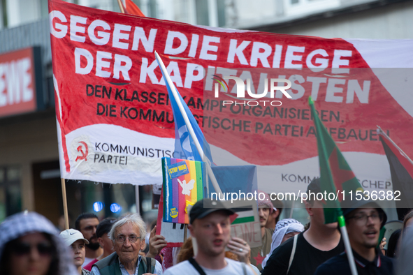 A few hundred people take part in an anti-war demonstration against government policy toward the war and demand peace in Cologne, Germany, o...