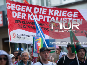 A few hundred people take part in an anti-war demonstration against government policy toward the war and demand peace in Cologne, Germany, o...