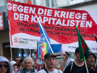 A few hundred people take part in an anti-war demonstration against government policy toward the war and demand peace in Cologne, Germany, o...