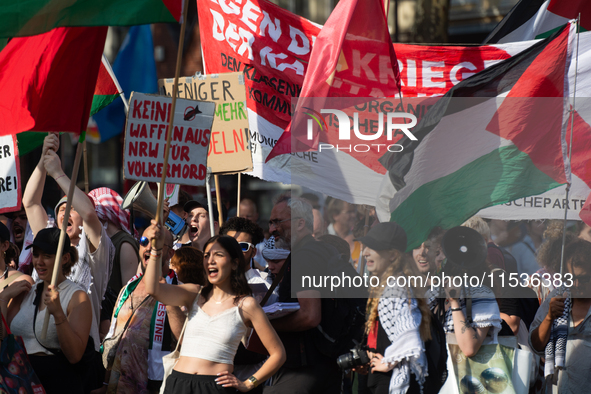 A few hundred people take part in an anti-war demonstration against government policy toward the war and demand peace in Cologne, Germany, o...