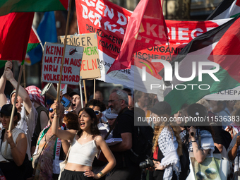 A few hundred people take part in an anti-war demonstration against government policy toward the war and demand peace in Cologne, Germany, o...