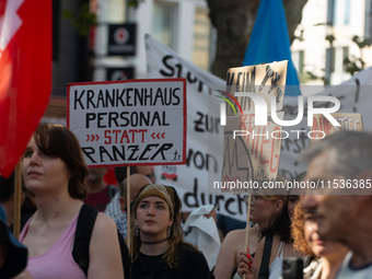 A few hundred people take part in an anti-war demonstration against government policy toward the war and demand peace in Cologne, Germany, o...