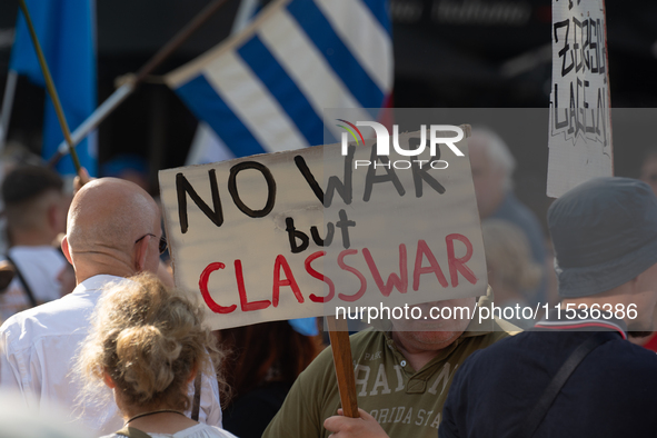 A few hundred people take part in an anti-war demonstration against government policy toward the war and demand peace in Cologne, Germany, o...