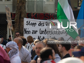 A few hundred people take part in an anti-war demonstration against government policy toward the war and demand peace in Cologne, Germany, o...