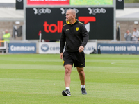 Burton Albion's manager Mark Robinson stands before the Sky Bet League 1 match between Northampton Town and Burton Albion at the PTS Academy...