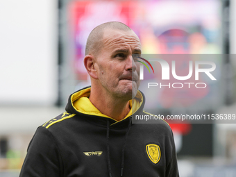 Burton Albion's manager Mark Robinson stands before the Sky Bet League 1 match between Northampton Town and Burton Albion at the PTS Academy...