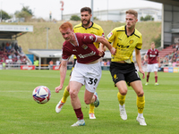 Liam McCarron of Northampton Town and Jack Armer of Burton Albion get confrontational during the second half of the Sky Bet League 1 match b...