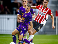 Go Ahead Eagles player Mithis Suray and PSV player Joey Veerman during the match PSV vs. Go Ahead Eagles at the Philips Stadium for the Dutc...