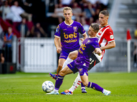 Go Ahead Eagles player Mithis Suray and PSV player Joey Veerman during the match PSV vs. Go Ahead Eagles at the Philips Stadium for the Dutc...