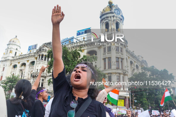 Students shout slogans during a rally in Kolkata, India, on September 1, 2024, demanding punishment for the accused involved in the rape and...