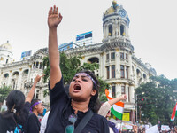 Students shout slogans during a rally in Kolkata, India, on September 1, 2024, demanding punishment for the accused involved in the rape and...