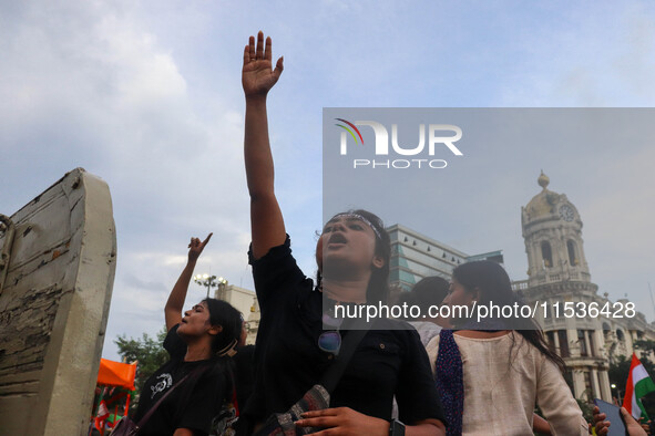 Students shout slogans during a rally in Kolkata, India, on September 1, 2024, demanding punishment for the accused involved in the rape and...