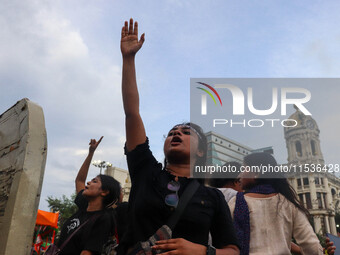 Students shout slogans during a rally in Kolkata, India, on September 1, 2024, demanding punishment for the accused involved in the rape and...