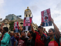 Students and citizens hold various posters during a rally in Kolkata, India, on September 1, 2024, demanding punishment for the accused invo...