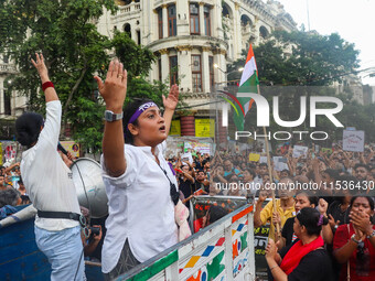 Students shout slogans during a rally in Kolkata, India, on September 1, 2024, demanding punishment for the accused involved in the rape and...