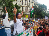 Students shout slogans during a rally in Kolkata, India, on September 1, 2024, demanding punishment for the accused involved in the rape and...