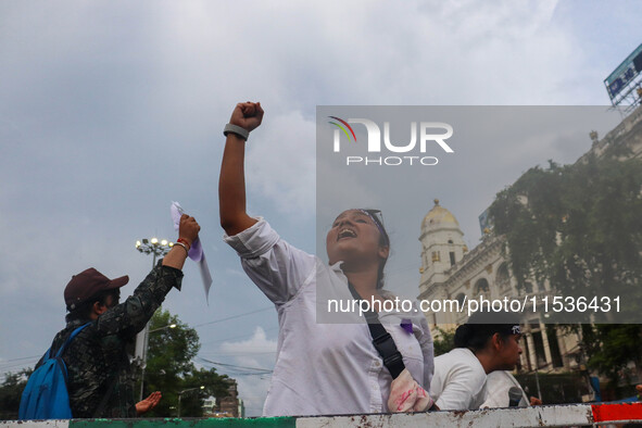 Students shout slogans during a rally in Kolkata, India, on September 1, 2024, demanding punishment for the accused involved in the rape and...