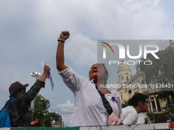 Students shout slogans during a rally in Kolkata, India, on September 1, 2024, demanding punishment for the accused involved in the rape and...