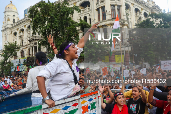 Students shout slogans during a rally in Kolkata, India, on September 1, 2024, demanding punishment for the accused involved in the rape and...