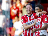 PSV player Malik Tillman and PSV player Joey Veerman celebrate the goal during the match between PSV and Go Ahead Eagles at the Philips Stad...