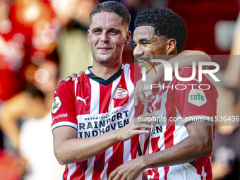 PSV player Malik Tillman and PSV player Joey Veerman celebrate the goal during the match between PSV and Go Ahead Eagles at the Philips Stad...