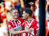 PSV player Malik Tillman and PSV player Joey Veerman celebrate the goal during the match between PSV and Go Ahead Eagles at the Philips Stad...