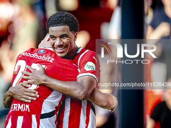 PSV player Malik Tillman and PSV player Joey Veerman celebrate the goal during the match between PSV and Go Ahead Eagles at the Philips Stad...