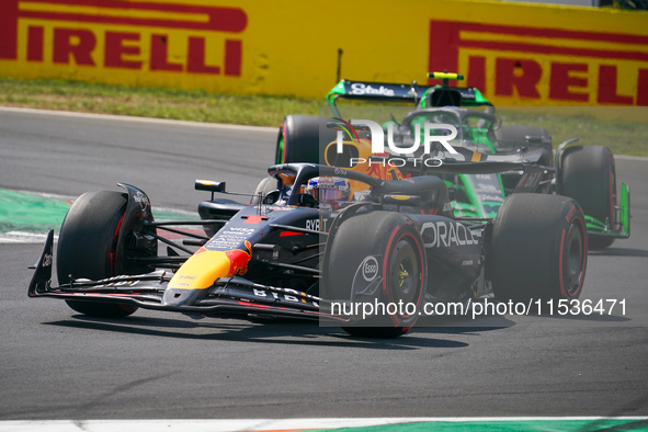 Max Verstappen of the Netherlands drives the Oracle Red Bull Racing RB20 Honda RBPT during the race of the Formula 1 Pirelli Gran Premio d'I...