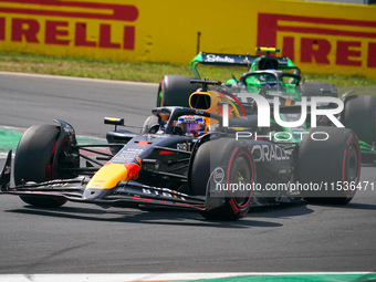 Max Verstappen of the Netherlands drives the Oracle Red Bull Racing RB20 Honda RBPT during the race of the Formula 1 Pirelli Gran Premio d'I...