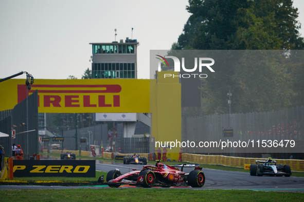 Carlos Sainz Jr. of Spain drives the (55) Scuderia Ferrari SF-24 Ferrari during the race of the Formula 1 Pirelli Gran Premio d'Italia 2024...