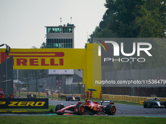 Carlos Sainz Jr. of Spain drives the (55) Scuderia Ferrari SF-24 Ferrari during the race of the Formula 1 Pirelli Gran Premio d'Italia 2024...