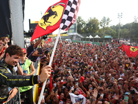 Charles Leclerc of Ferrari celebrates with fans after the Formula 1 Italian Grand Prix at Autodromo Nazionale di Monza in Monza, Italy on Se...