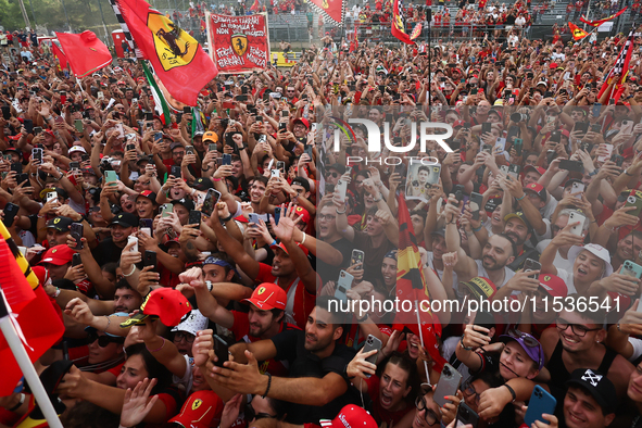 Charles Leclerc of Ferrari celebrates after the Formula 1 Italian Grand Prix at Autodromo Nazionale di Monza in Monza, Italy on September 1,...