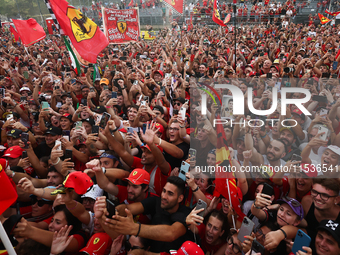 Charles Leclerc of Ferrari celebrates after the Formula 1 Italian Grand Prix at Autodromo Nazionale di Monza in Monza, Italy on September 1,...