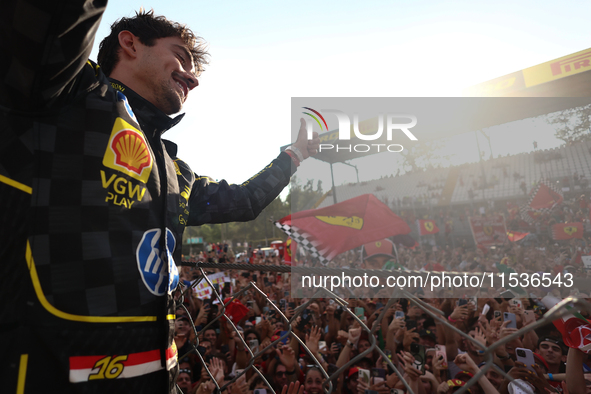 Charles Leclerc of Ferrari celebrates after the Formula 1 Italian Grand Prix at Autodromo Nazionale di Monza in Monza, Italy on September 1,...