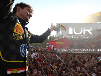 Charles Leclerc of Ferrari celebrates after the Formula 1 Italian Grand Prix at Autodromo Nazionale di Monza in Monza, Italy on September 1,...