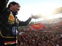 Charles Leclerc of Ferrari celebrates after the Formula 1 Italian Grand Prix at Autodromo Nazionale di Monza in Monza, Italy on September 1,...