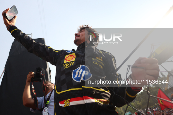 Charles Leclerc of Ferrari celebrates after the Formula 1 Italian Grand Prix at Autodromo Nazionale di Monza in Monza, Italy on September 1,...