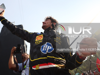 Charles Leclerc of Ferrari celebrates after the Formula 1 Italian Grand Prix at Autodromo Nazionale di Monza in Monza, Italy on September 1,...