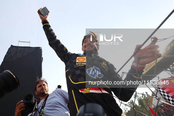 Charles Leclerc of Ferrari celebrates after the Formula 1 Italian Grand Prix at Autodromo Nazionale di Monza in Monza, Italy on September 1,...