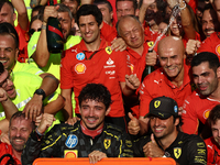 Charles Leclerc, Carlos Sainz of Ferrari and Frederic Vasseur celebrate with the team after the Formula 1 Italian Grand Prix at Autodromo Na...