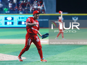 Tomohiro Anraku #20 of Diablos Rojos celebrates after match 6 of the Mexican Baseball League (LMB) South Zone 2024 championship series again...