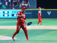 Tomohiro Anraku #20 of Diablos Rojos celebrates after match 6 of the Mexican Baseball League (LMB) South Zone 2024 championship series again...