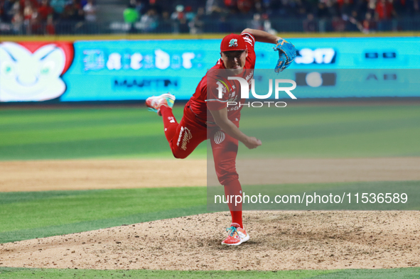 Tomohiro Anraku #20 of Diablos Rojos pitches the ball during match 6 of the Mexican Baseball League (LMB) South Zone 2024 championship serie...