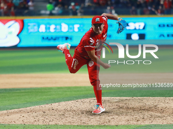 Tomohiro Anraku #20 of Diablos Rojos pitches the ball during match 6 of the Mexican Baseball League (LMB) South Zone 2024 championship serie...