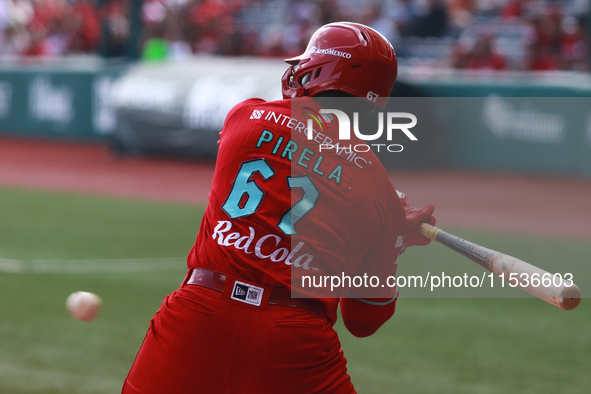 Jose Pirela #67 of Diablos Rojos bats during match 6 of the Mexican Baseball League (LMB) South Zone 2024 championship series against Guerre...