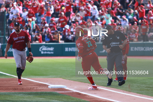 Robinson Cano #22 of Diablos Rojos runs to the first base plate during match 6 of the Mexican Baseball League (LMB) South Zone 2024 champion...