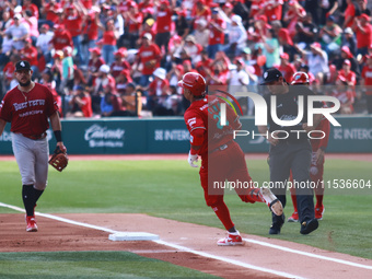 Robinson Cano #22 of Diablos Rojos runs to the first base plate during match 6 of the Mexican Baseball League (LMB) South Zone 2024 champion...