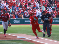 Robinson Cano #22 of Diablos Rojos runs to the first base plate during match 6 of the Mexican Baseball League (LMB) South Zone 2024 champion...